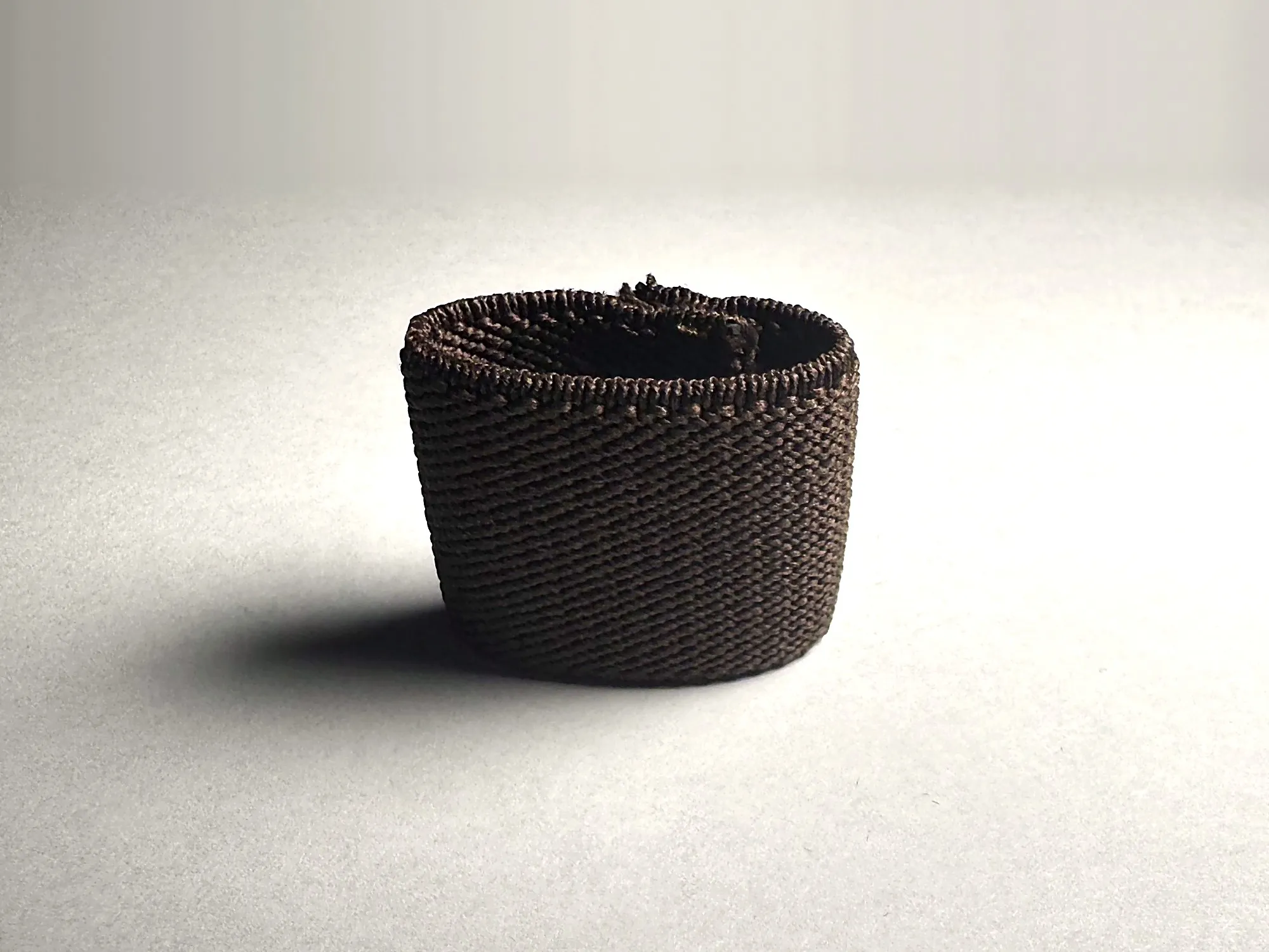 Brown Looped standing on a light background